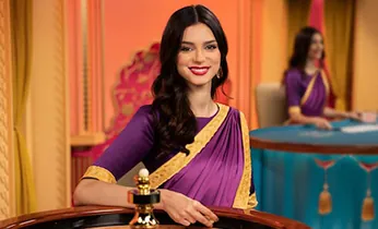 Người chia bài trực tiếp tại bàn chơi Live Casino của iwin 68